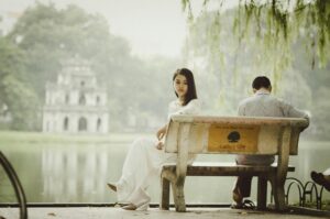 inner beauty and wellness A couple sitting on a bench near Hanoi